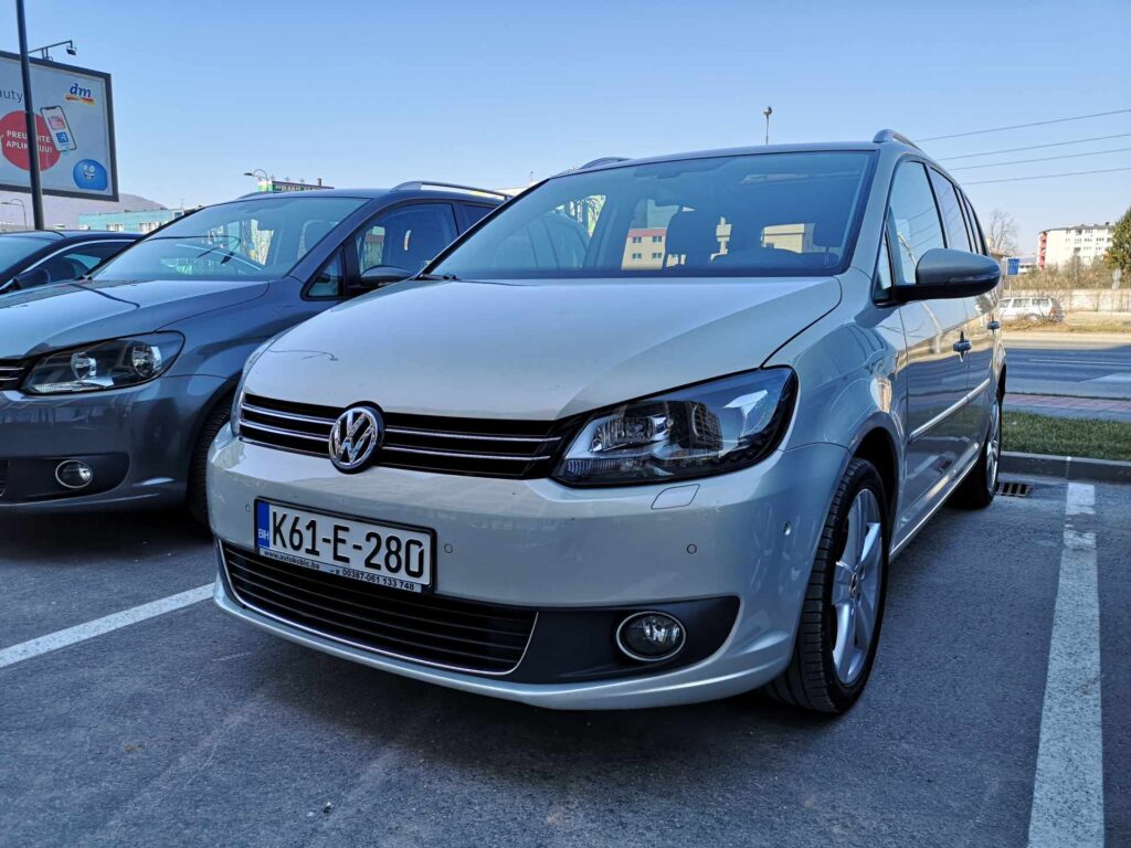Rental car Volkswagen Touran parked